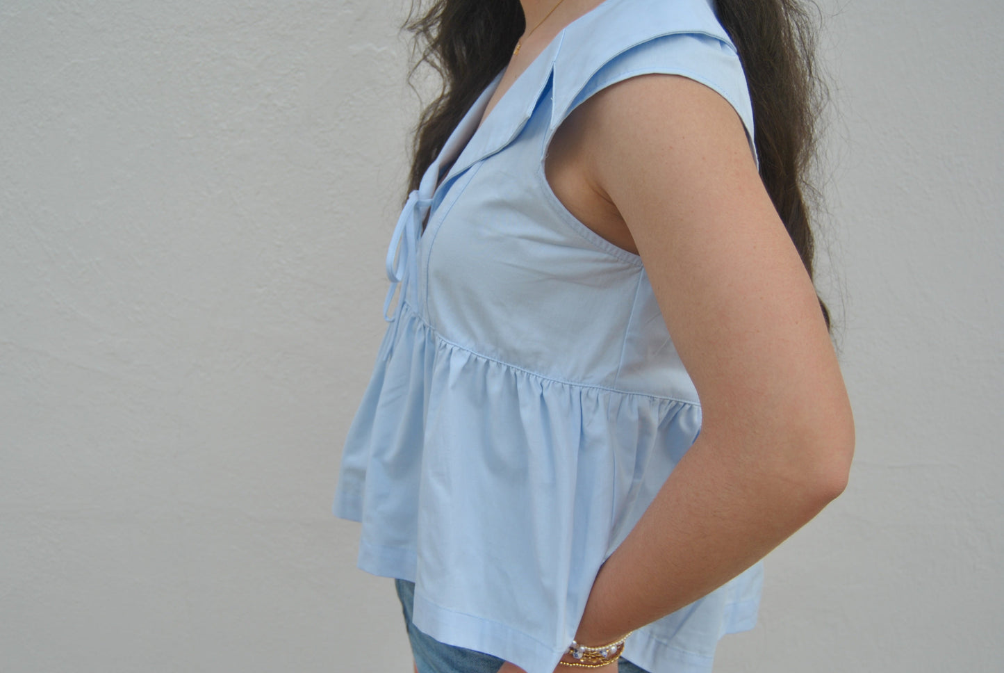 Sleeveless Collared Peplum Hem Top