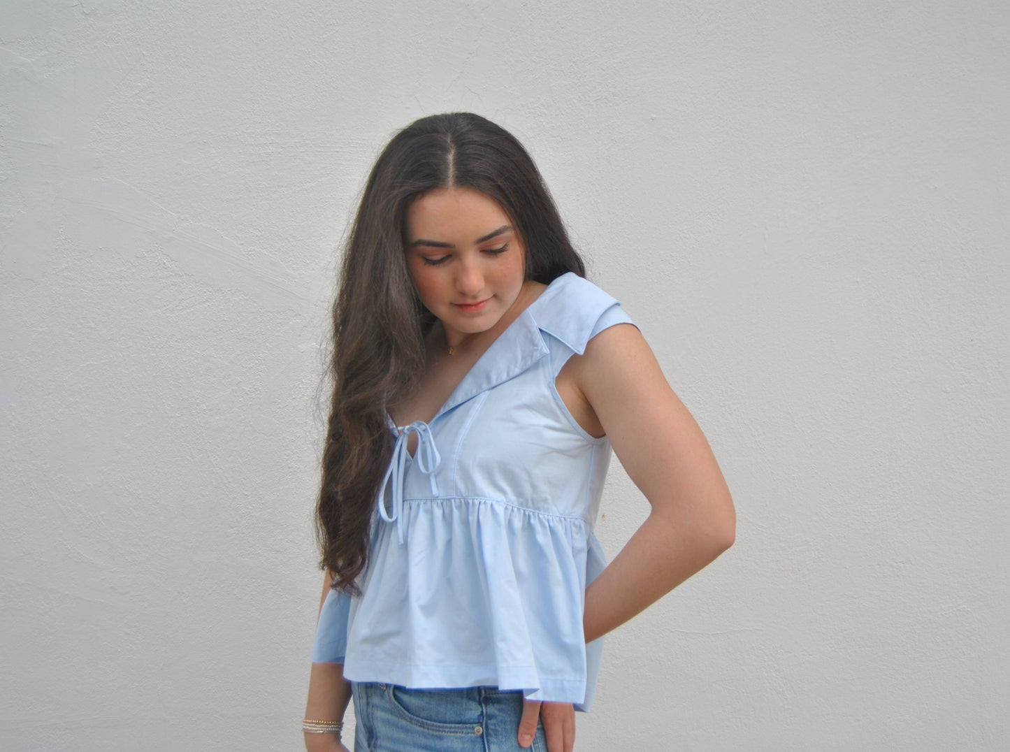 Sleeveless Collared Peplum Hem Top